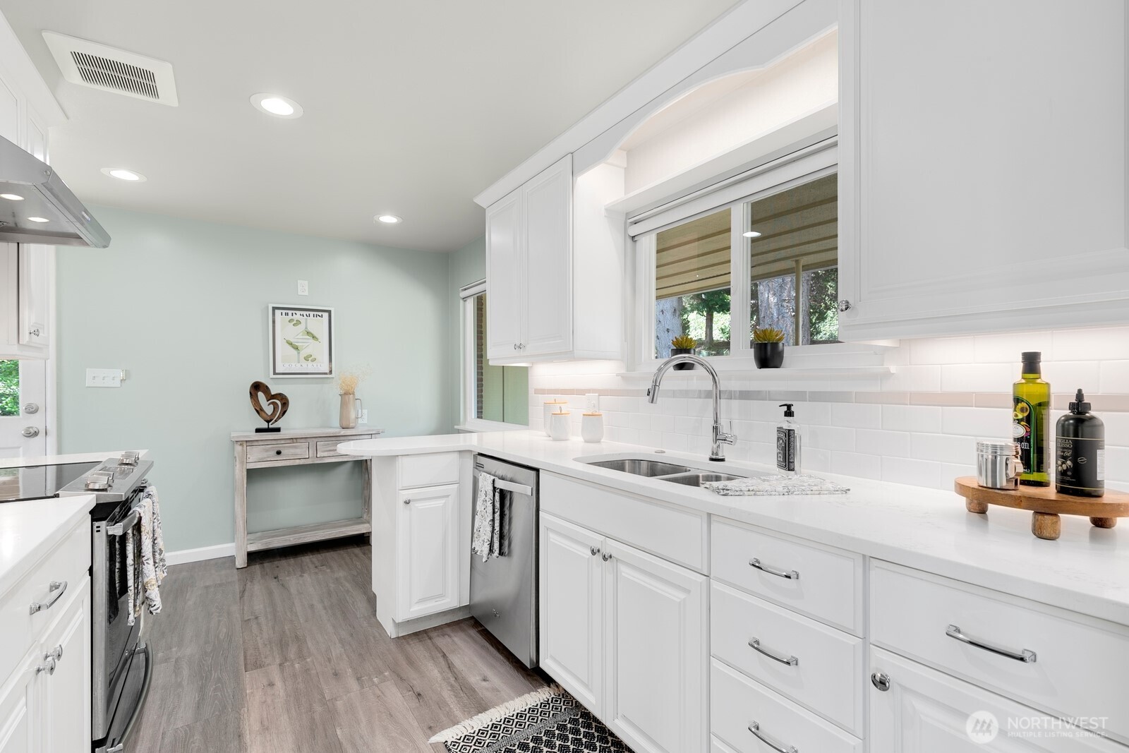 1429 Southwest 170th Street Normandy Park, WA 98166 - Photo 12 of 31 a kitchen with a sink cabinets and window