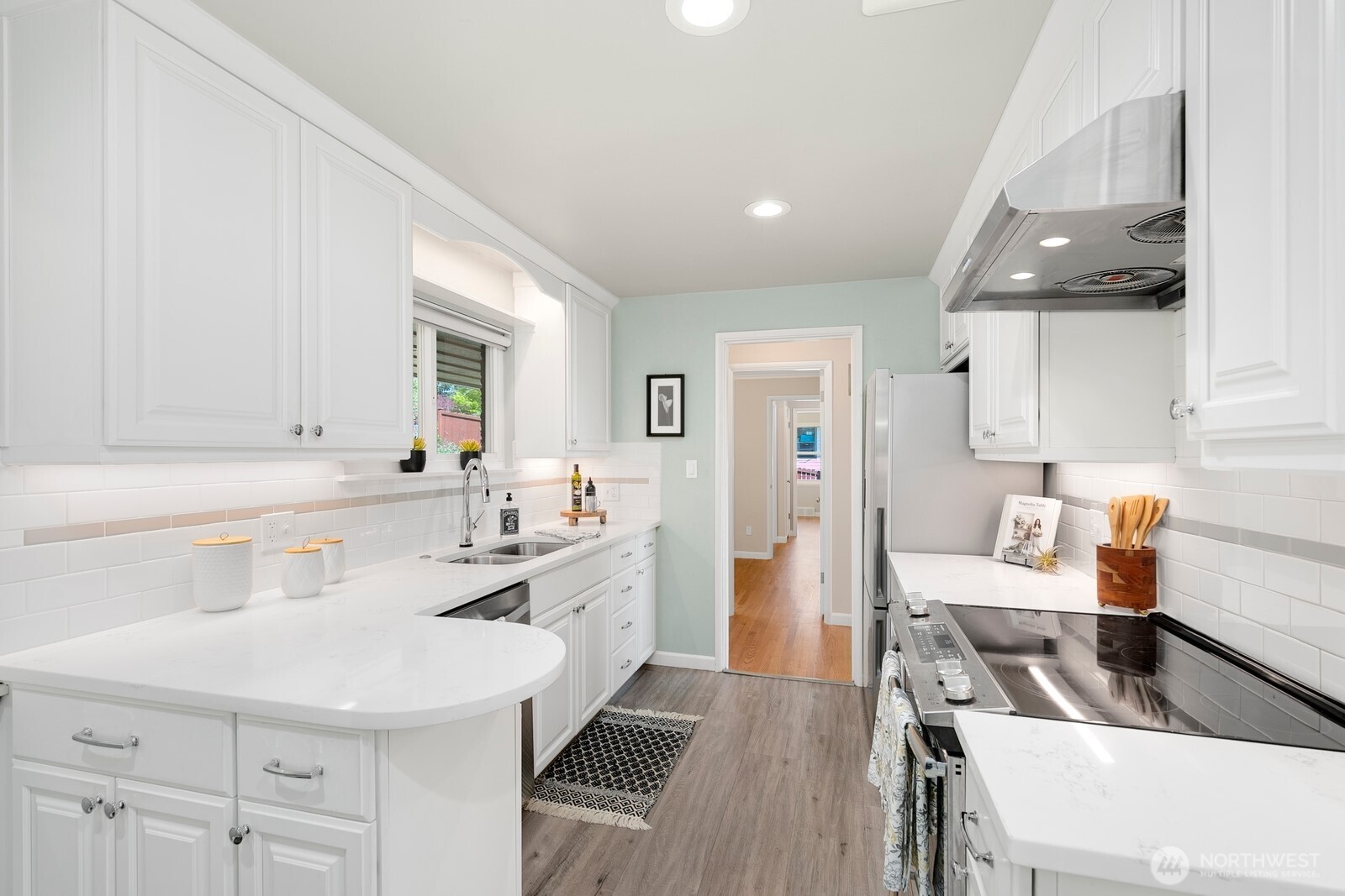 1429 Southwest 170th Street Normandy Park, WA 98166 - Photo 15 of 31 a kitchen with a sink appliances and cabinets
