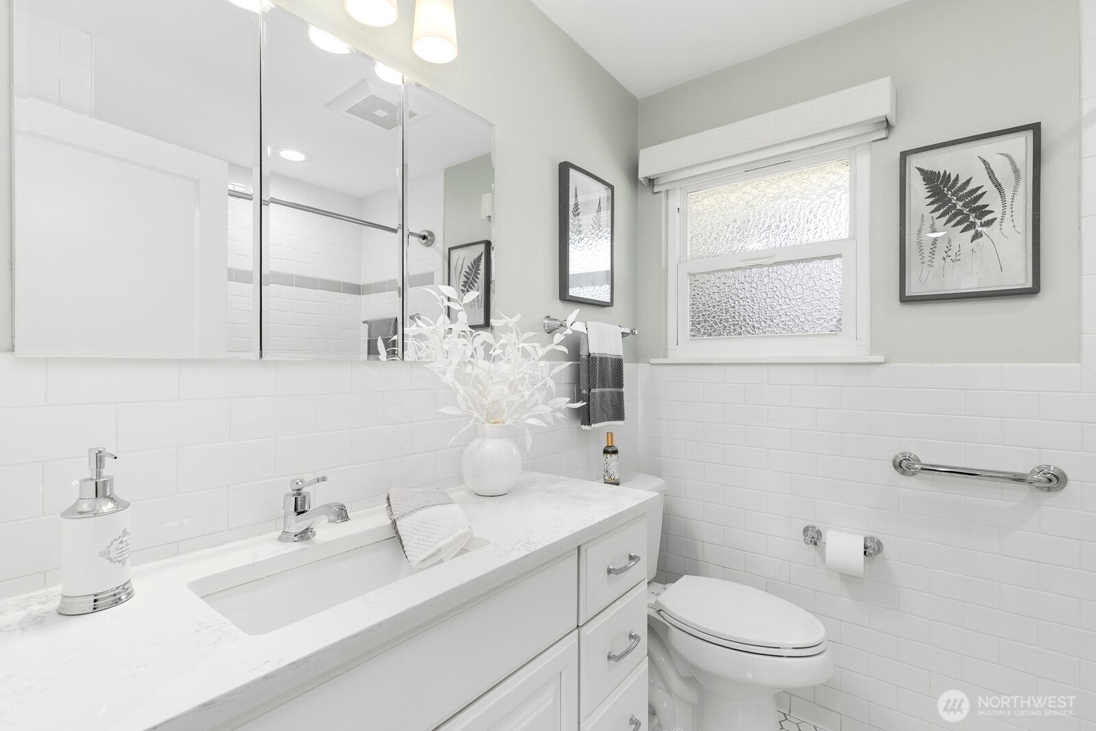 1429 Southwest 170th Street Normandy Park, WA 98166 - Photo 19 of 31 a bathroom with a sink toilet and mirror
