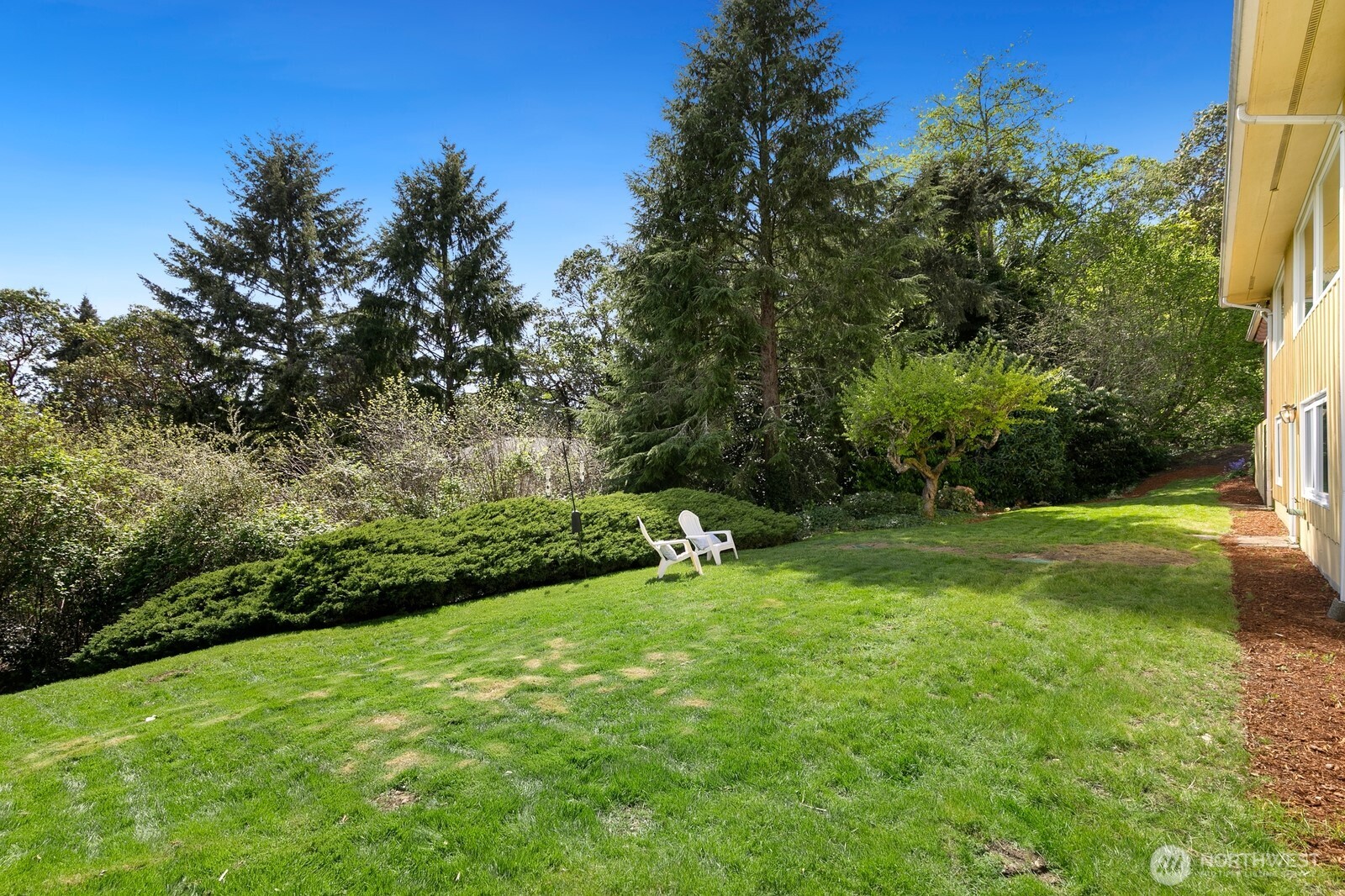 1429 Southwest 170th Street Normandy Park, WA 98166 - Photo 24 of 31 a view of a field of grass and trees