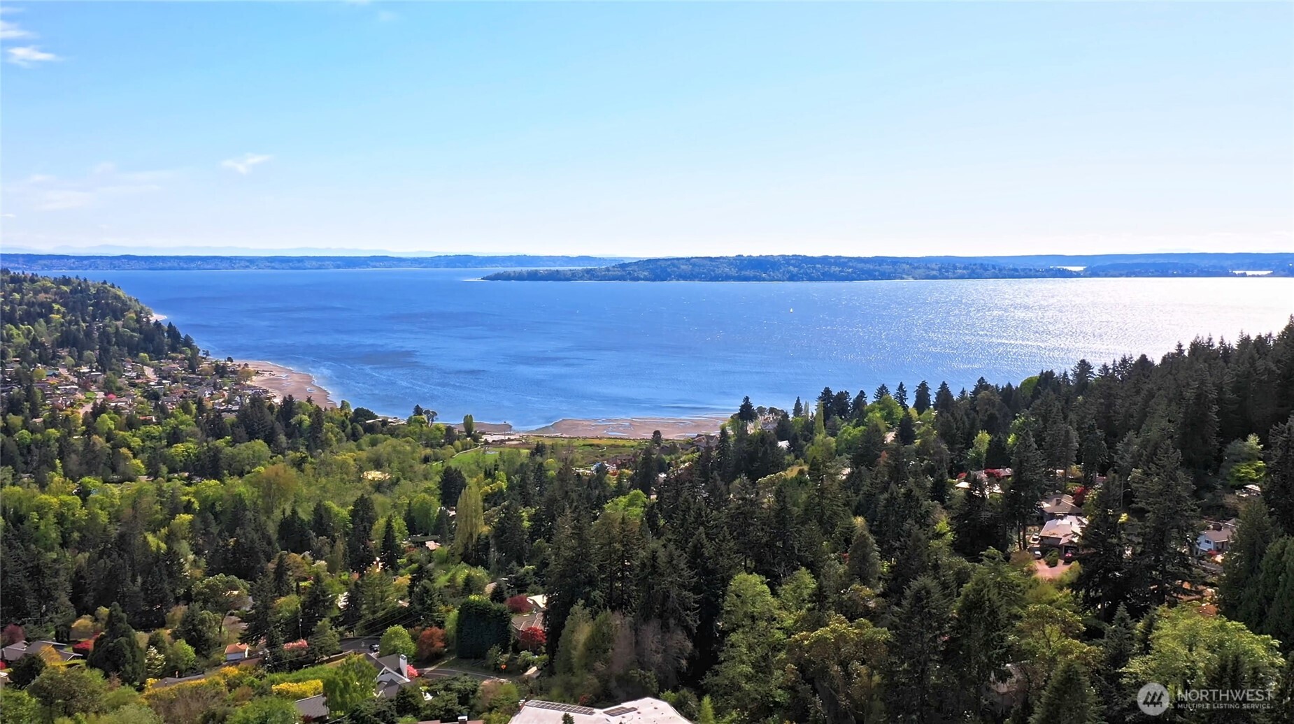 1429 Southwest 170th Street Normandy Park, WA 98166 - Photo 31 of 31 a view of a large body of water with a building in the background