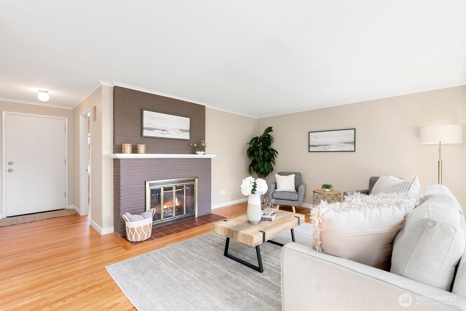 1429 Southwest 170th Street Normandy Park, WA 98166 - Photo 8 of 31 a living room with furniture and a fireplace