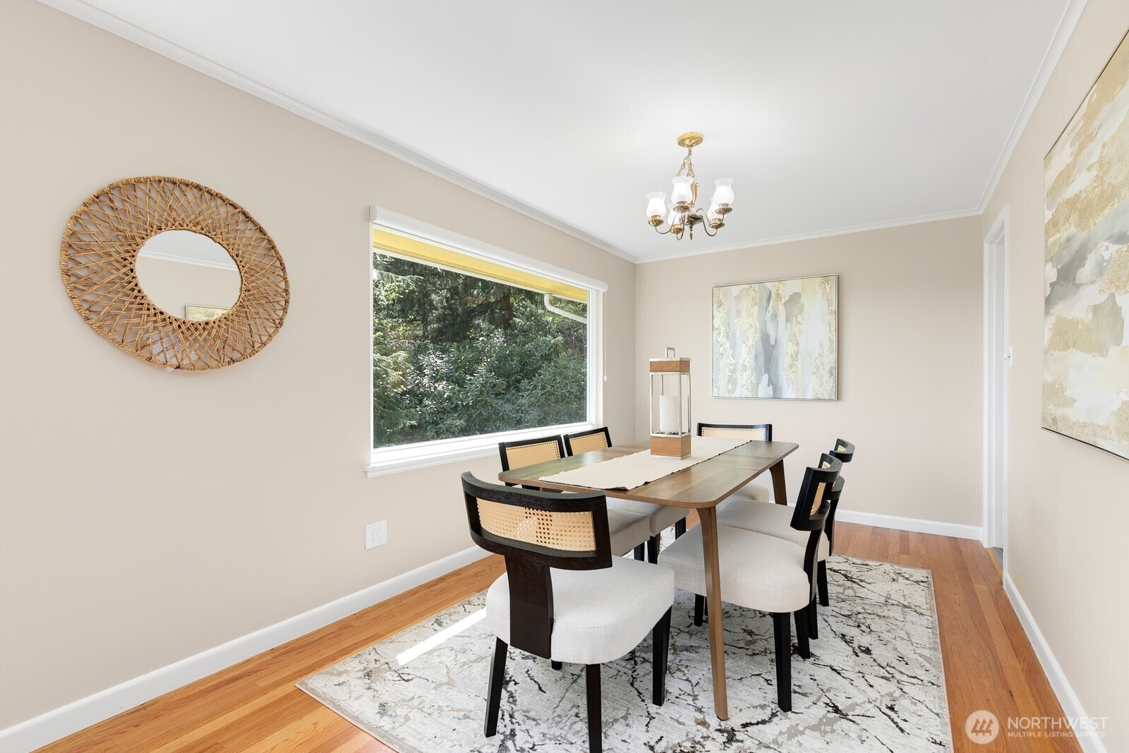 1429 Southwest 170th Street Normandy Park, WA 98166 - Photo 10 of 31 a view of a dining room with furniture and chandelier