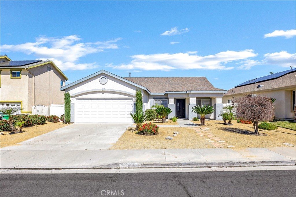 a house with yard in front of it