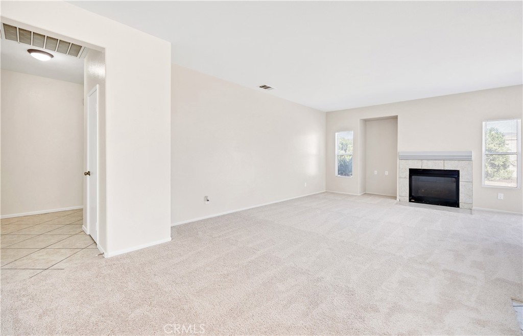 43850 Tiber Street Hemet, CA 92544 - Photo 14 of 39 a view of empty room with fireplace