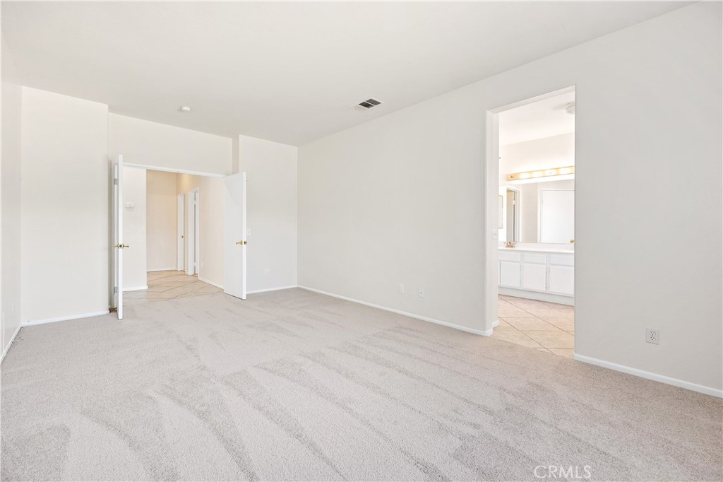 43850 Tiber Street Hemet, CA 92544 - Photo 25 of 39 a view of an empty room with a window