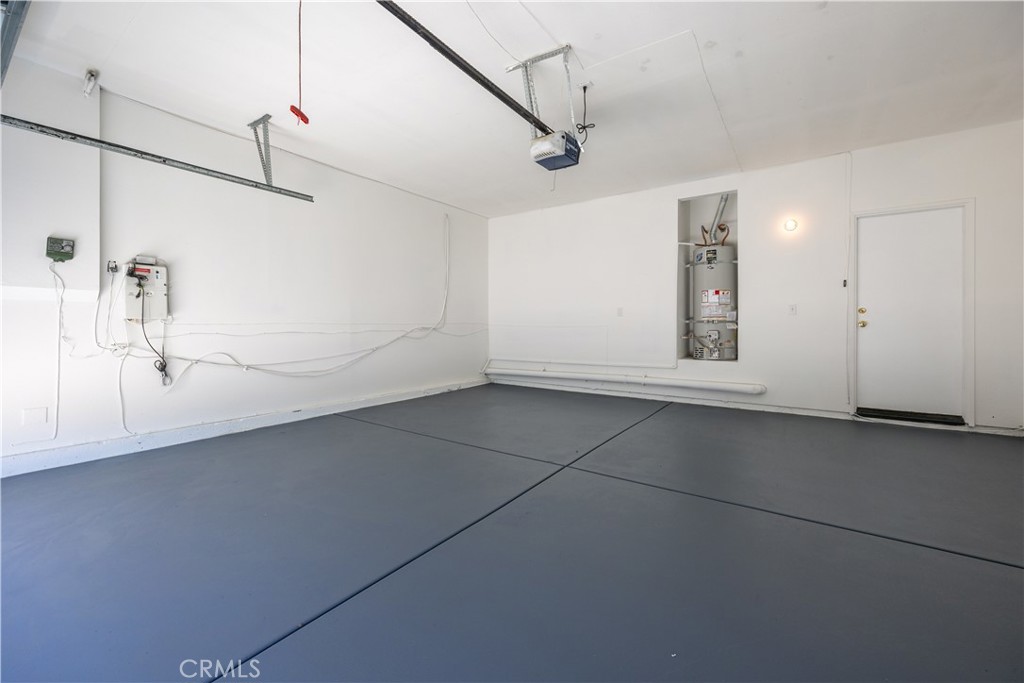 43850 Tiber Street Hemet, CA 92544 - Photo 34 of 39 a view of a livingroom with a dishwasher and fireplace