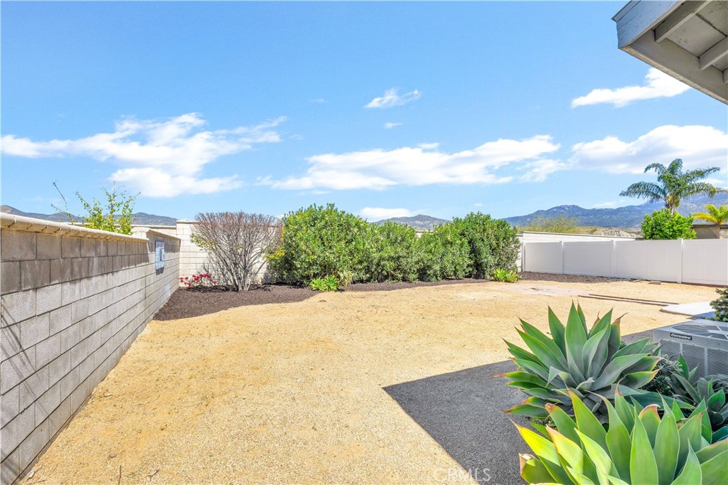 43850 Tiber Street Hemet, CA 92544 - Photo 37 of 39 a view of a house with a swimming pool