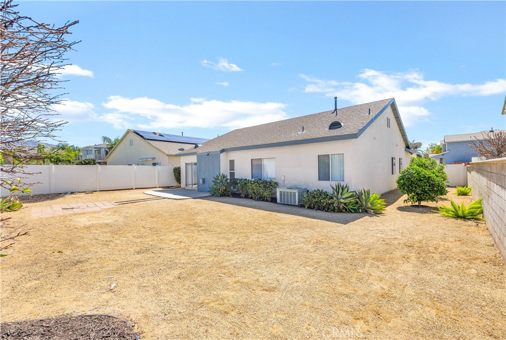 43850 Tiber Street Hemet, CA 92544 - Photo 39 of 39 a front view of house with yard and trees in the background