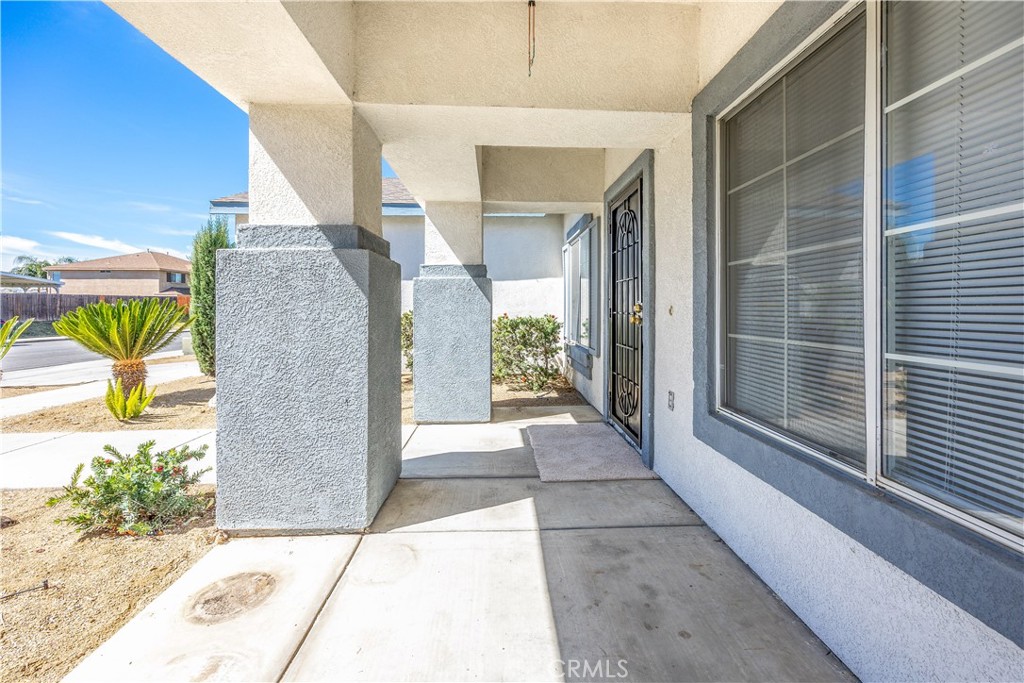 43850 Tiber Street Hemet, CA 92544 - Photo 5 of 39 a view of a balcony with a potted plant