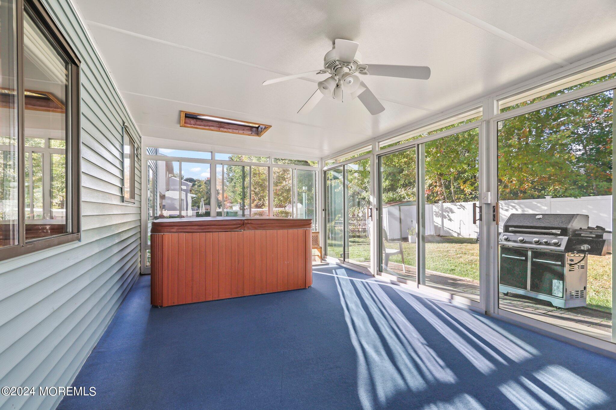 14 Cherry Bend Drive Howell, NJ 07731 - Photo 19 of 47 a view of a room with wooden floor and windows