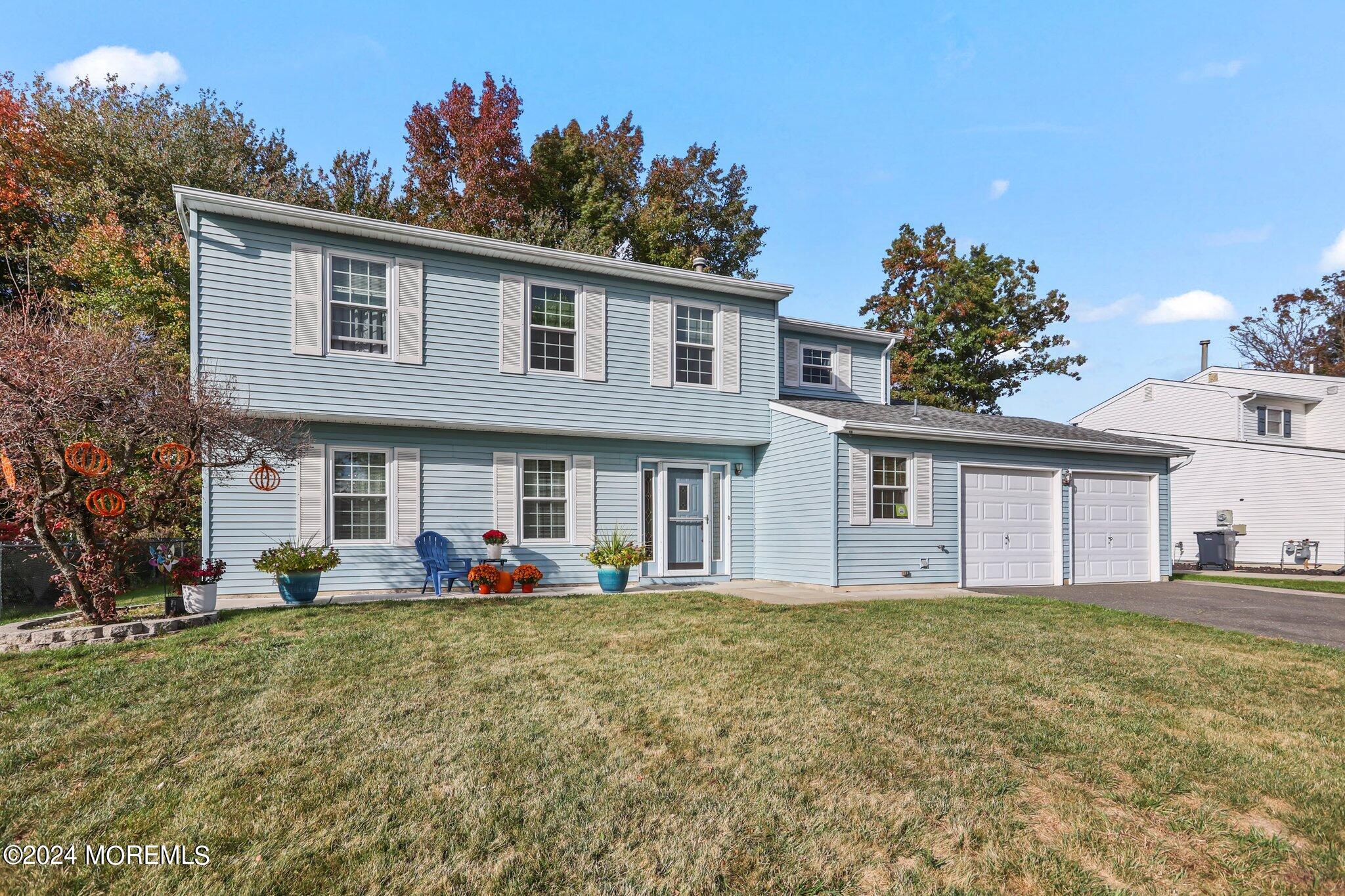14 Cherry Bend Drive Howell, NJ 07731 - Photo 2 of 47 a front view of house with yard