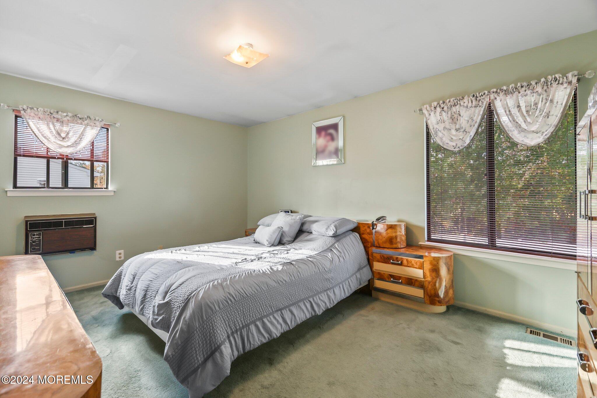 14 Cherry Bend Drive Howell, NJ 07731 - Photo 31 of 47 a bedroom with a bed and a large window