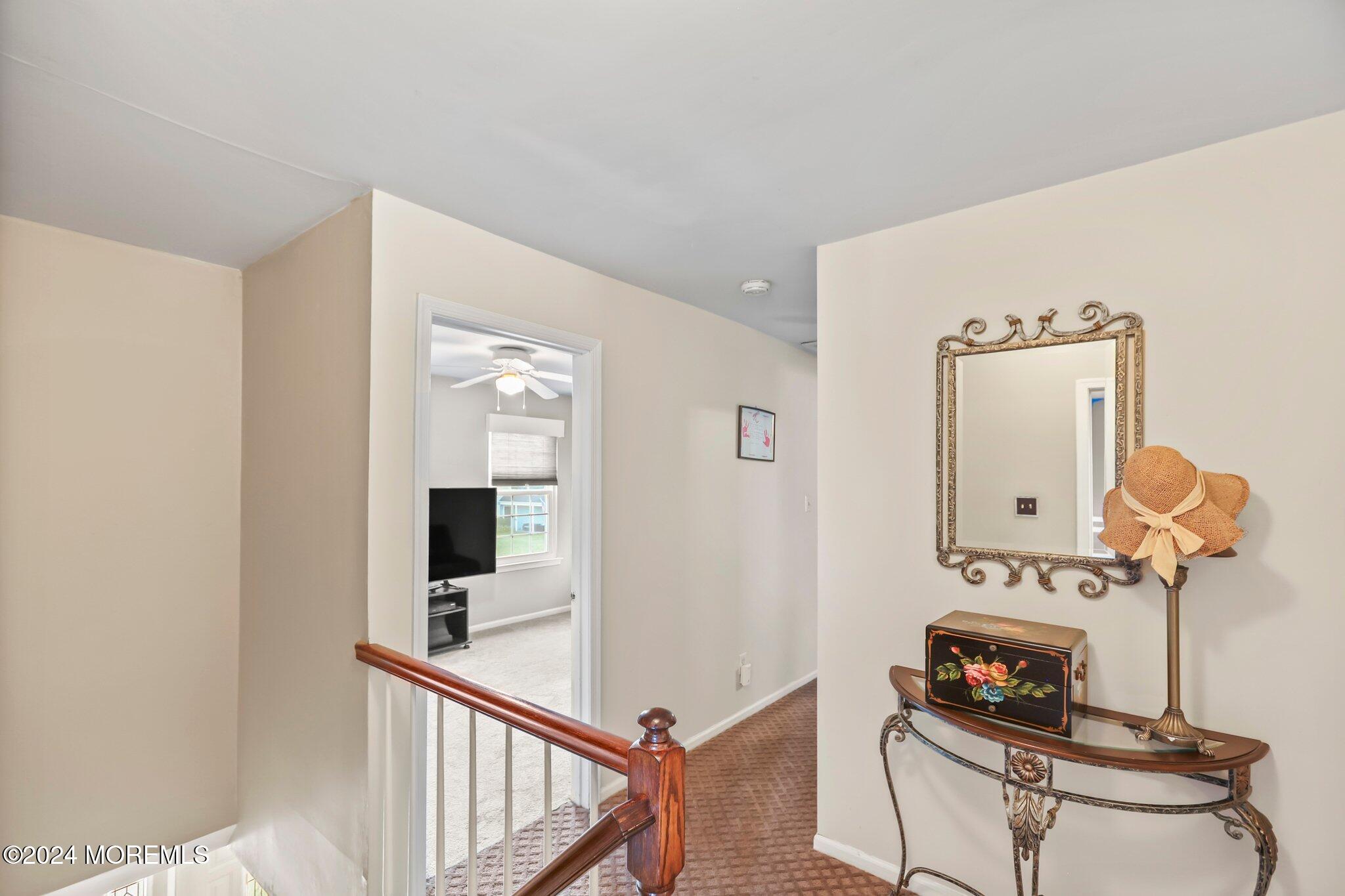 14 Cherry Bend Drive Howell, NJ 07731 - Photo 35 of 47 a living room with furniture and a flat screen tv