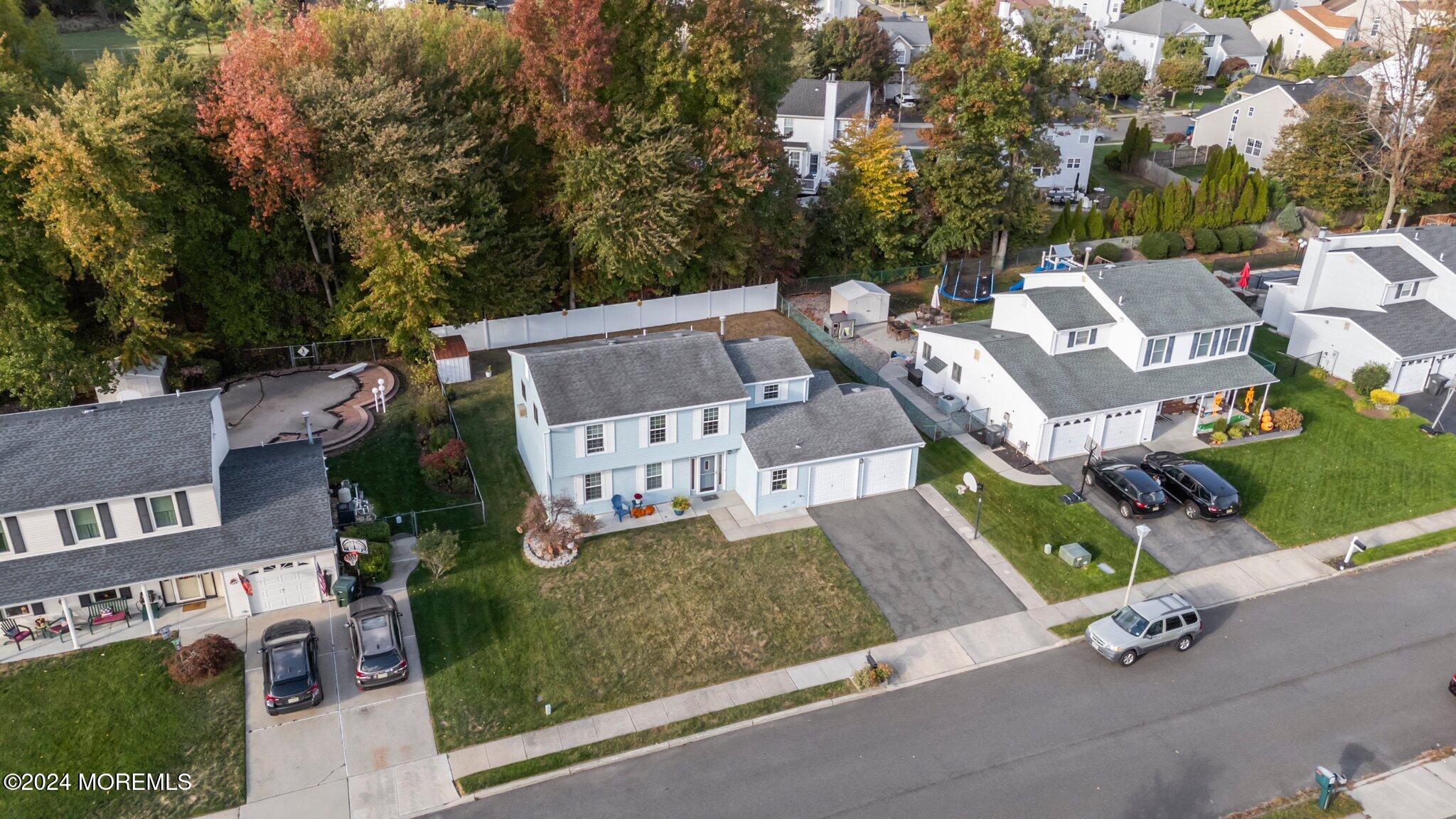 14 Cherry Bend Drive Howell, NJ 07731 - Photo 36 of 47 an aerial view of a house with garden space and street view