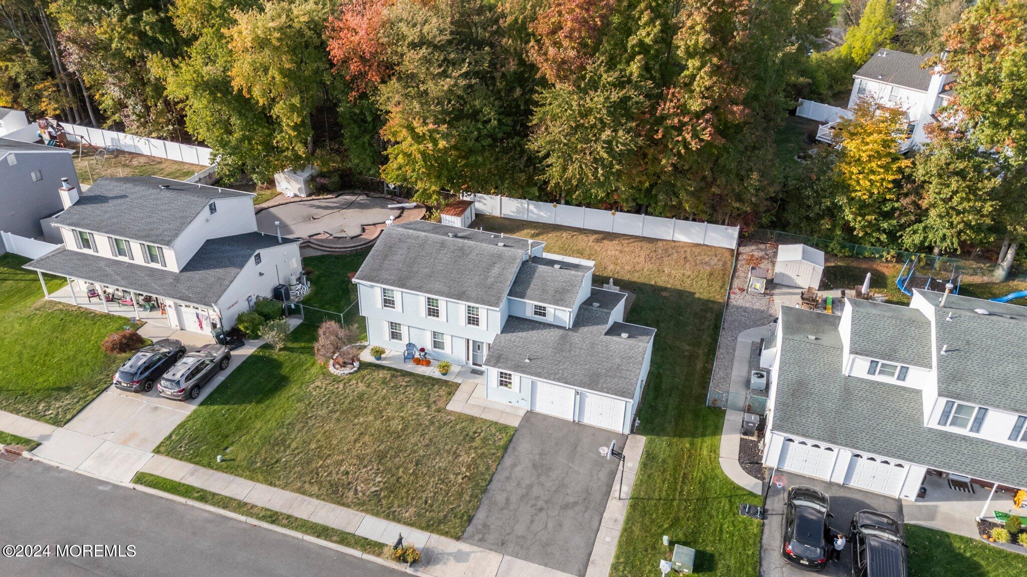 14 Cherry Bend Drive Howell, NJ 07731 - Photo 38 of 47 an aerial view of a house with garden space and street view