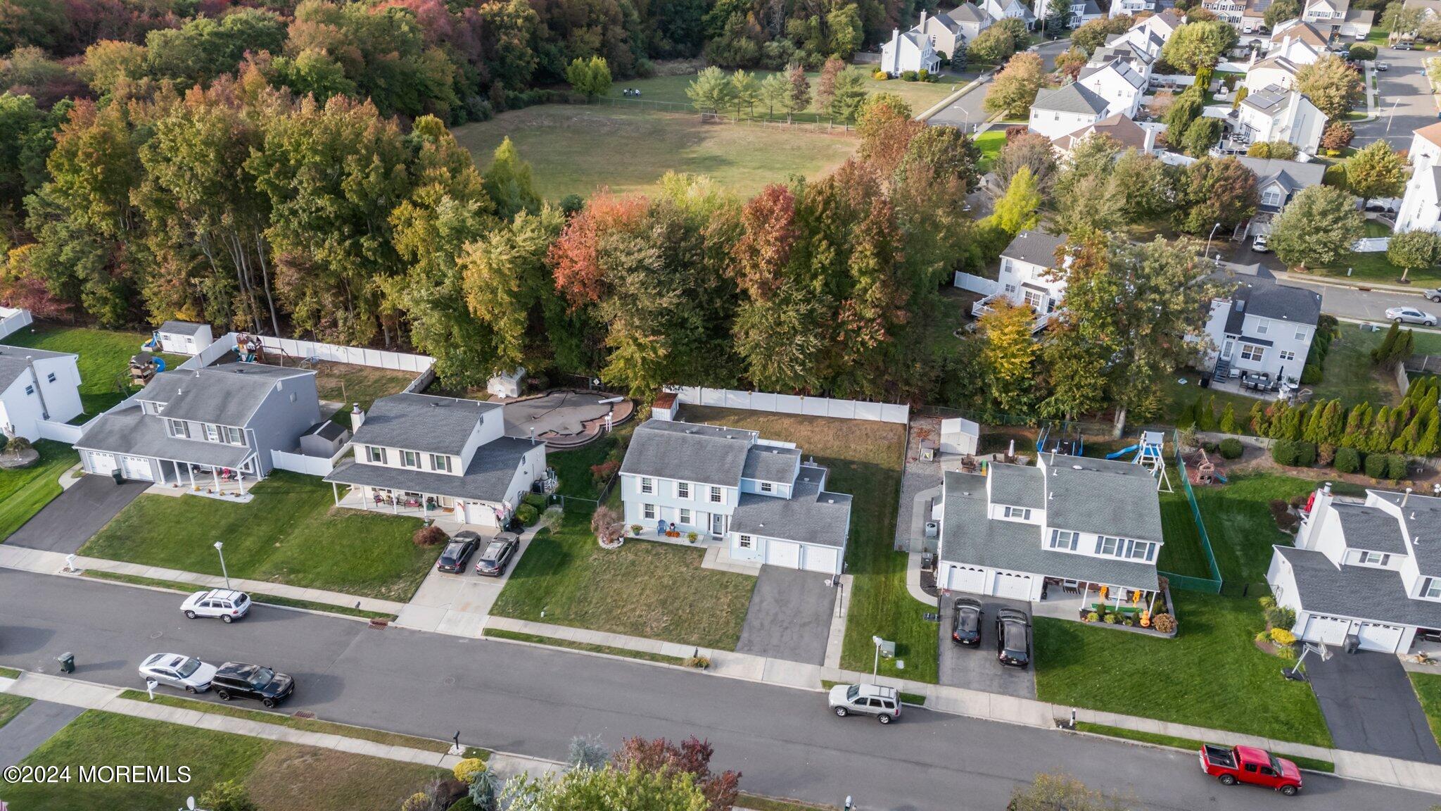 14 Cherry Bend Drive Howell, NJ 07731 - Photo 45 of 47 an aerial view of residential houses with outdoor space and parking