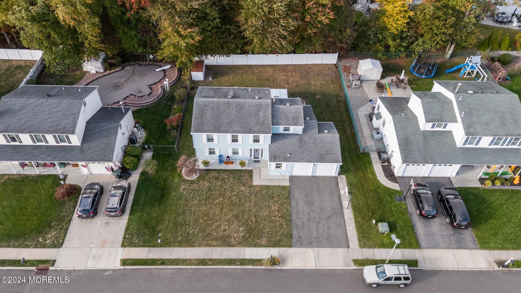 14 Cherry Bend Drive Howell, NJ 07731 - Photo 46 of 47 an aerial view of residential houses with outdoor space and parking