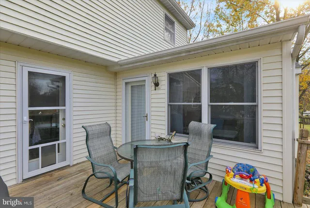 a view of two chairs in the balcony