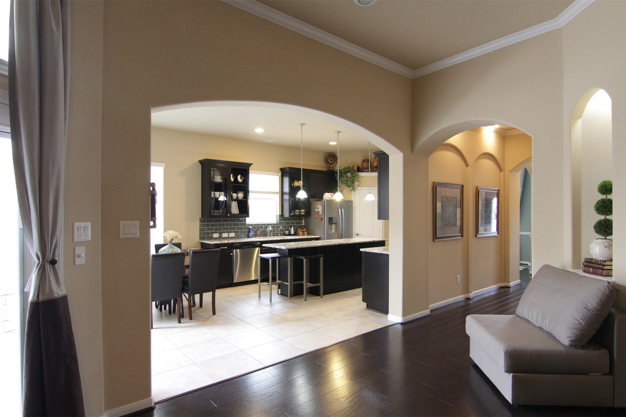 1423 Ralston Branch Way Sugar Land, TX 77479 - Photo 10 of 43 breakfast off kitchen, plus breakfast bar with more seating around island