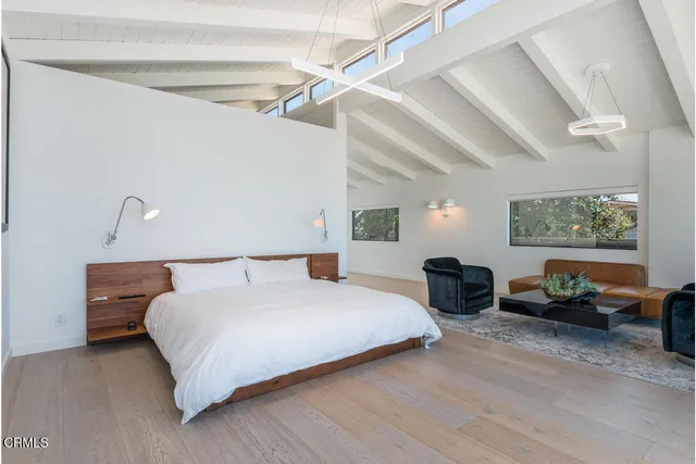 a white bath tub sitting next to a white sink