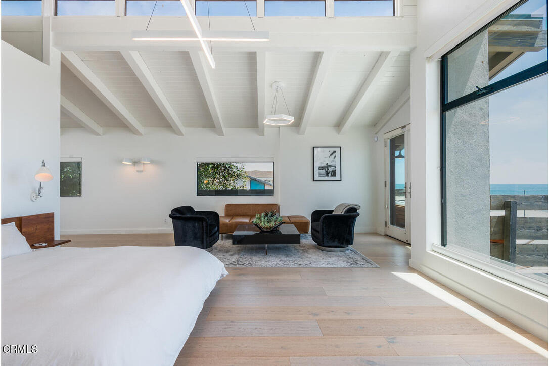 998 Sharon Lane Ventura, CA 93001 - Photo 27 of 42 a bedroom with furniture and a large window