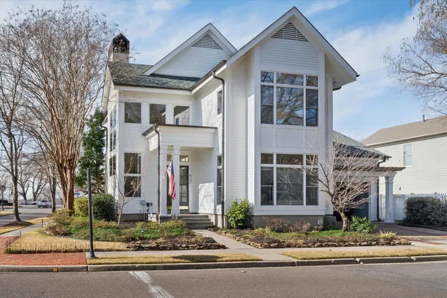 a front view of a house with street