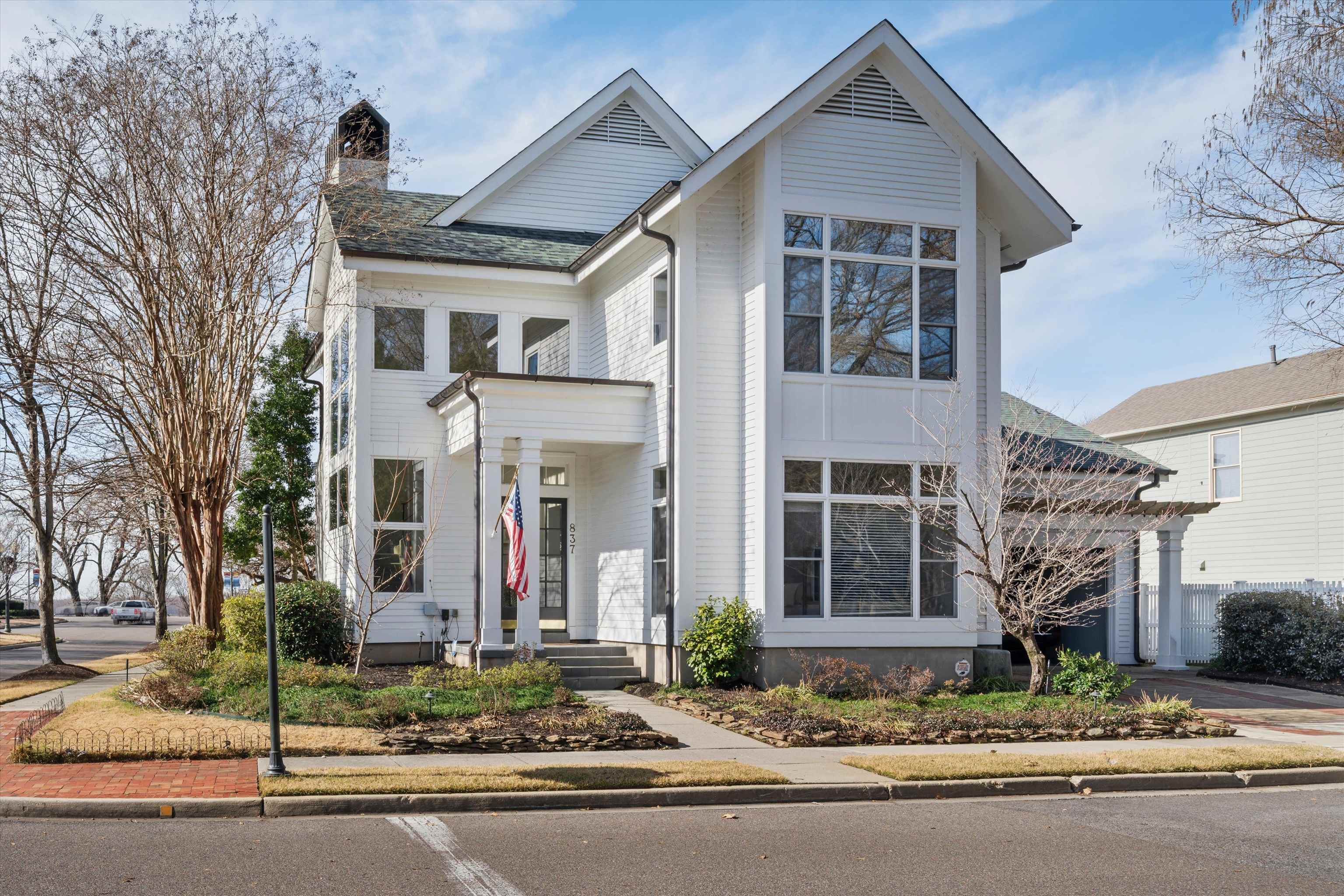 a front view of a house with street