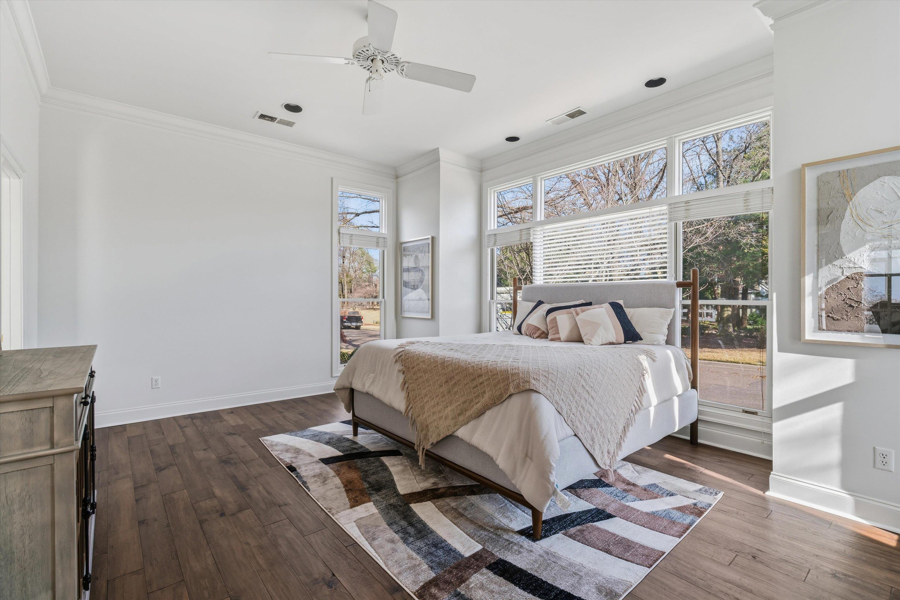 837 Harbor Bend Road Memphis, TN 38103 - Photo 12 of 35 a bedroom with a bed and wooden floor
