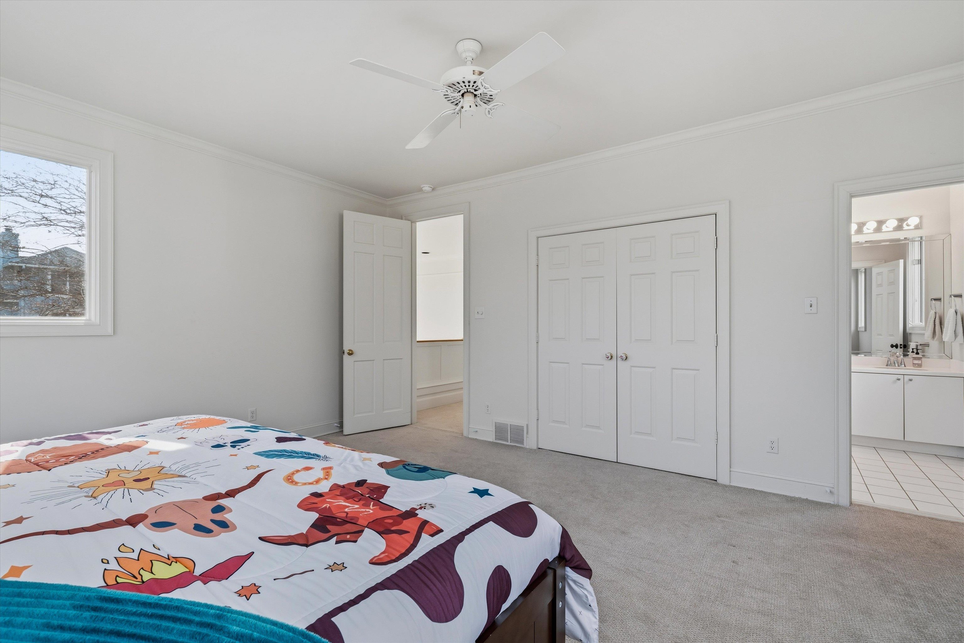 837 Harbor Bend Road Memphis, TN 38103 - Photo 16 of 35 a bedroom with a bed and a chandelier