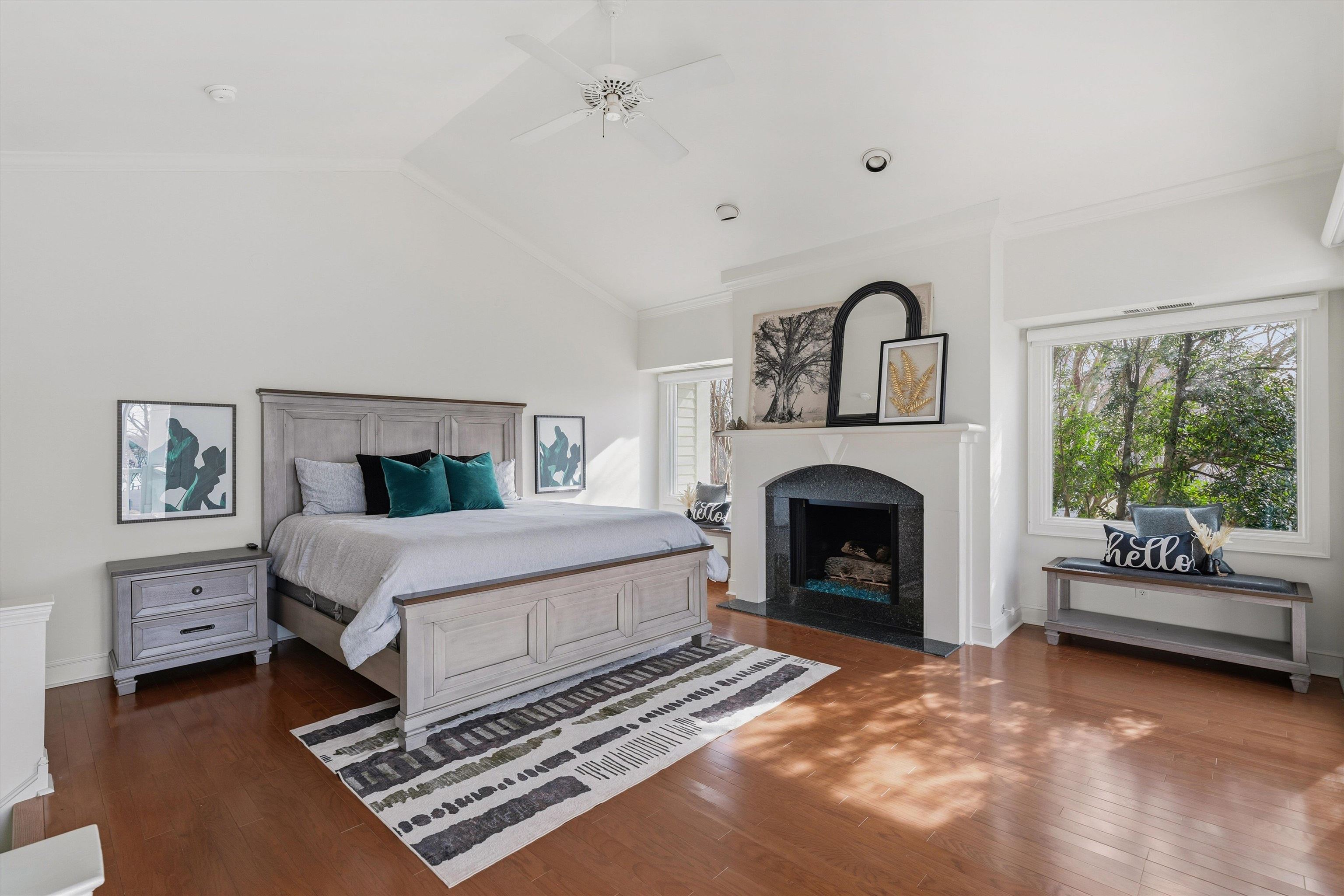 837 Harbor Bend Road Memphis, TN 38103 - Photo 18 of 35 a bedroom with a bed and a fireplace