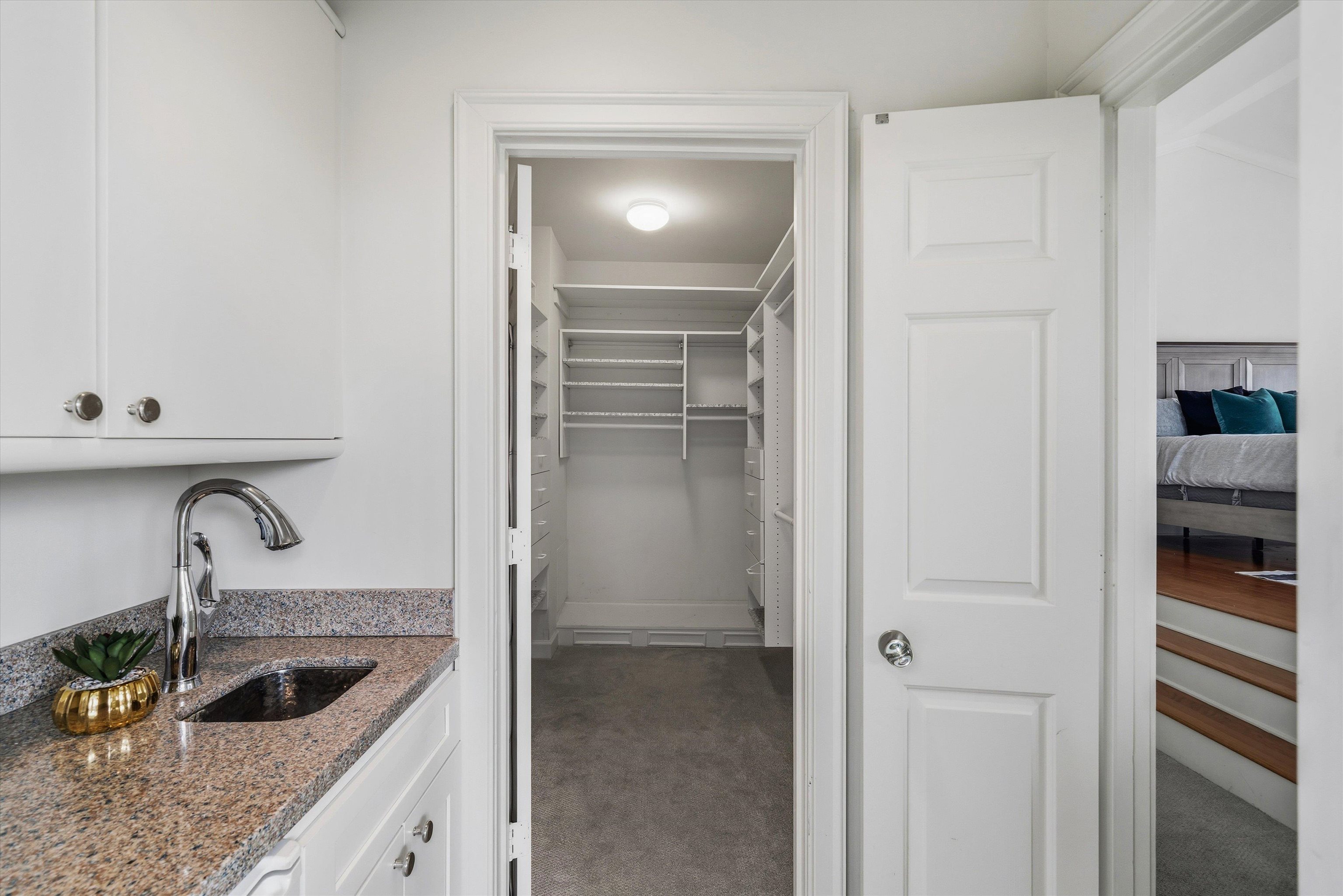 837 Harbor Bend Road Memphis, TN 38103 - Photo 21 of 35 a kitchen with a sink and refrigerator