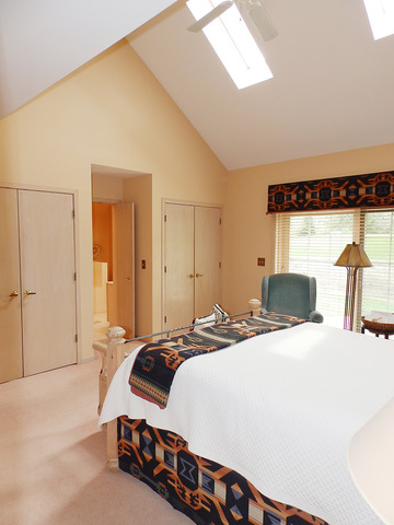 35W752 Parsons Road Dundee, IL 60102 - Photo 16 of 25 a bedroom with a bed and a mirror