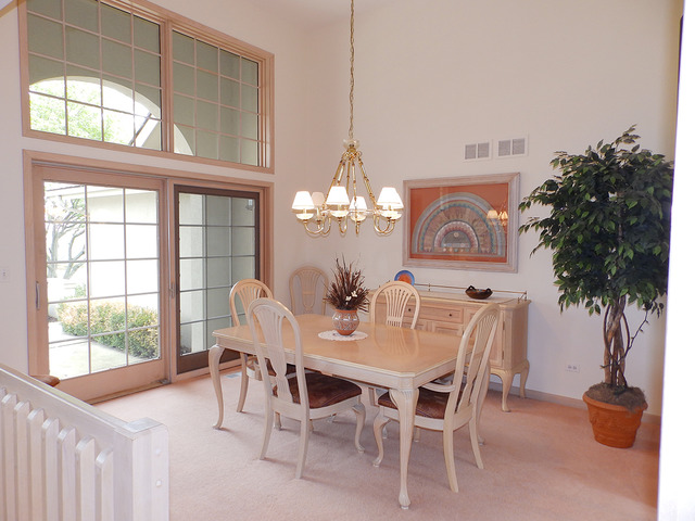 35W752 Parsons Road Dundee, IL 60102 - Photo 10 of 25 a dining room with furniture potted plants and a chandelier