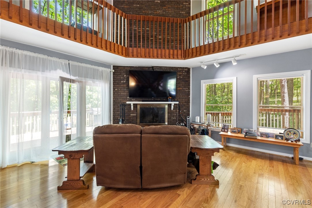 13320 Berkeley Road Orange, VA 22960 - Photo 13 of 46 a living room with furniture a fireplace and a large window