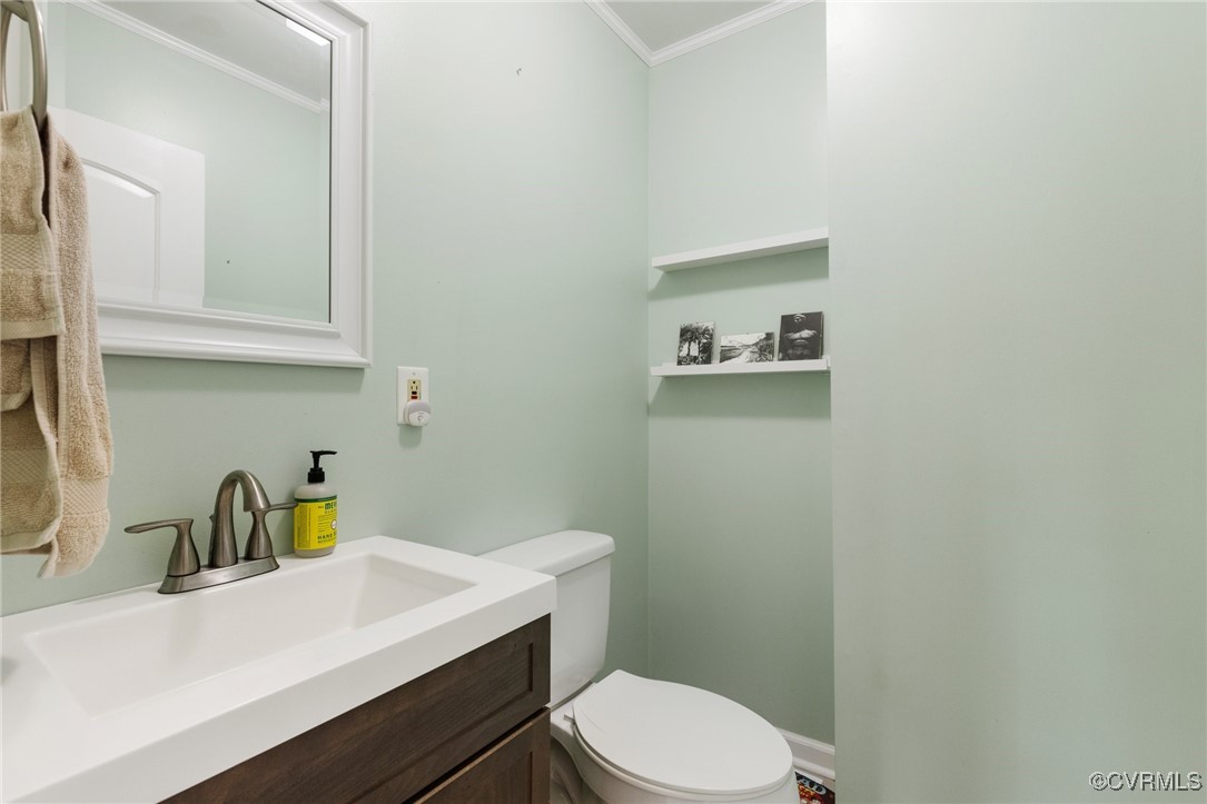 13320 Berkeley Road Orange, VA 22960 - Photo 26 of 46 a bathroom with a sink a toilet and vanity