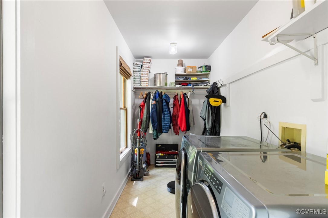 13320 Berkeley Road Orange, VA 22960 - Photo 27 of 46 a view of walk in closet with clothes and shoes