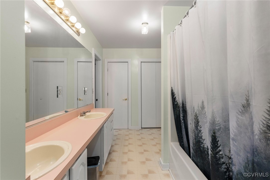 13320 Berkeley Road Orange, VA 22960 - Photo 32 of 46 a bathroom with a sink and mirror