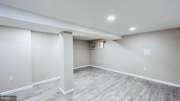 a view of a hallway with washer and dryer