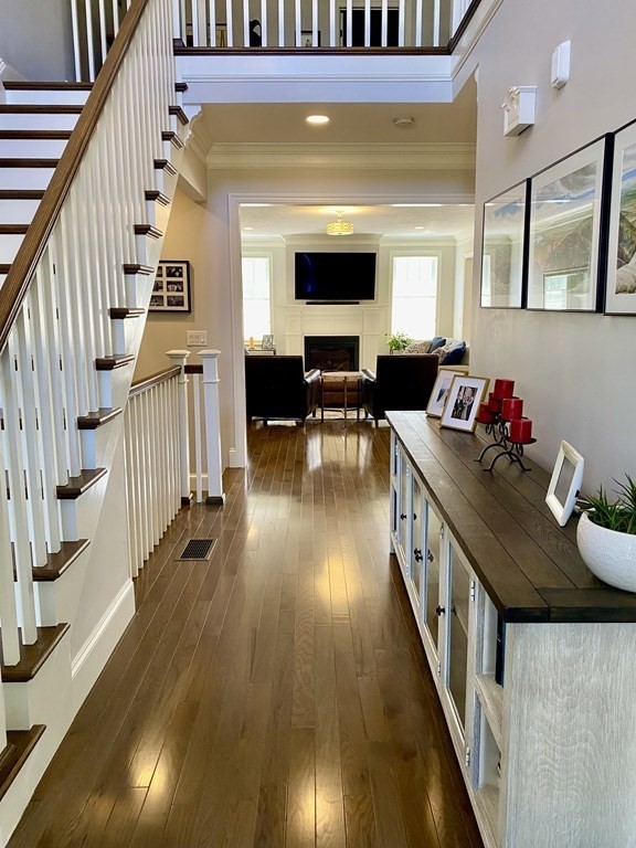 72 Brookview Road, Unit 72 Franklin, MA 02038 - Photo 14 of 29 a view of entryway and hall with wooden floor