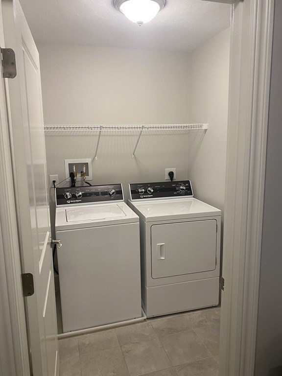 72 Brookview Road, Unit 72 Franklin, MA 02038 - Photo 21 of 29 a utility room with dryer and washer