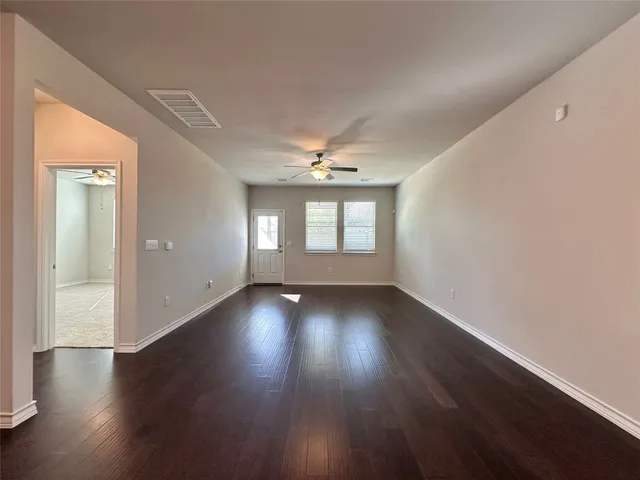 a bathroom with a shower and a sink