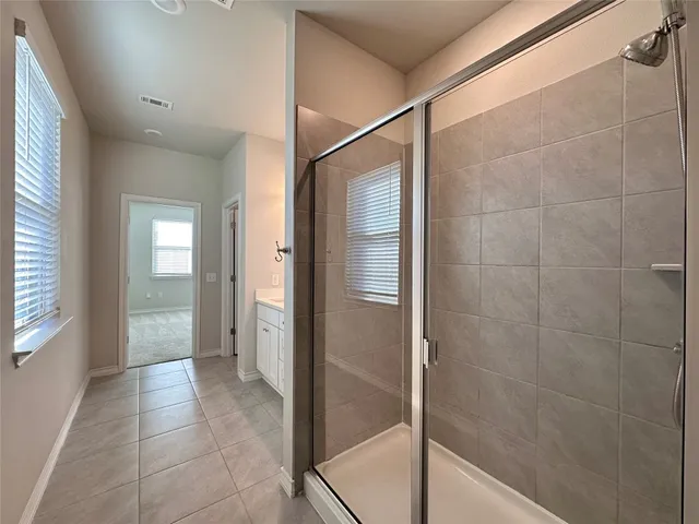 a view of an empty walk in closet