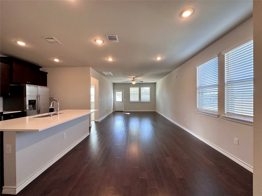 11604 Roxburgh Pass Manor, TX 78653 - Photo 40 of 40 a view of a kitchen with a sink and a large window