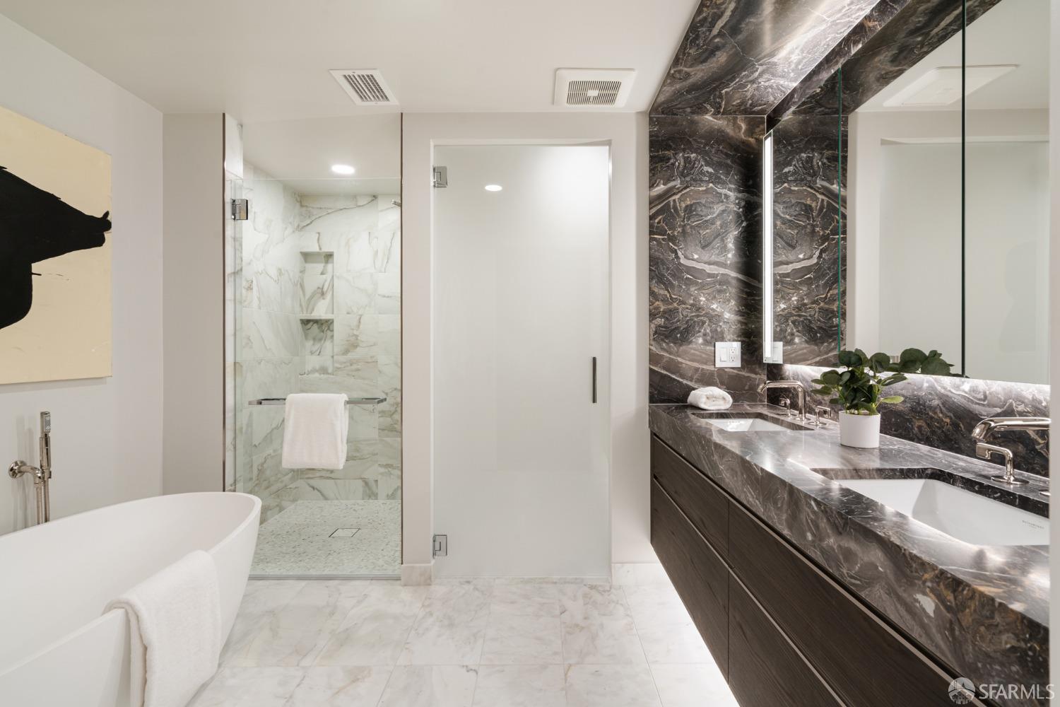 2525 Van Ness Avenue, Unit 601 San Francisco, CA 94109 - Photo 17 of 48 a bathroom with a granite countertop sink a toilet and shower