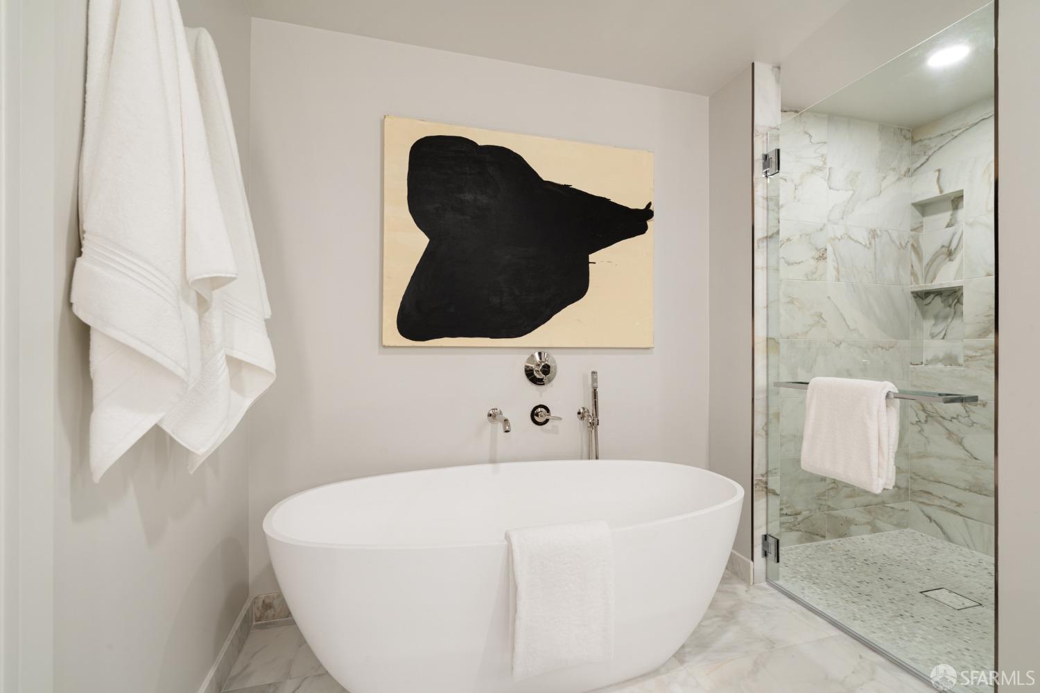 2525 Van Ness Avenue, Unit 601 San Francisco, CA 94109 - Photo 19 of 48 a bathroom with a bathtub and a shower