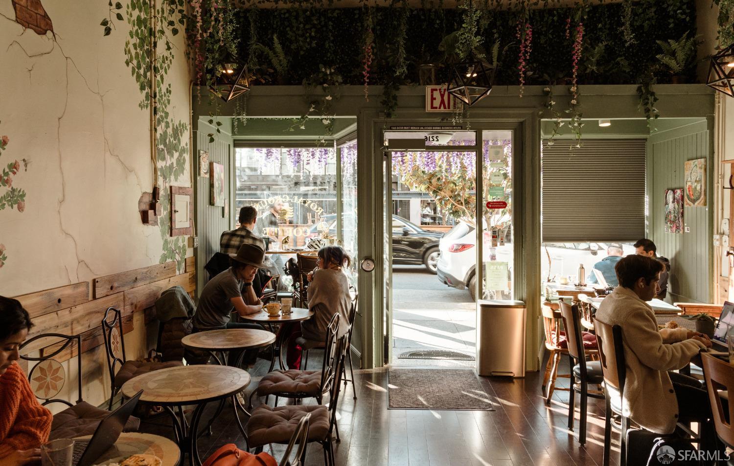2525 Van Ness Avenue, Unit 601 San Francisco, CA 94109 - Photo 42 of 48 a view of a dining room with furniture window and wooden floor