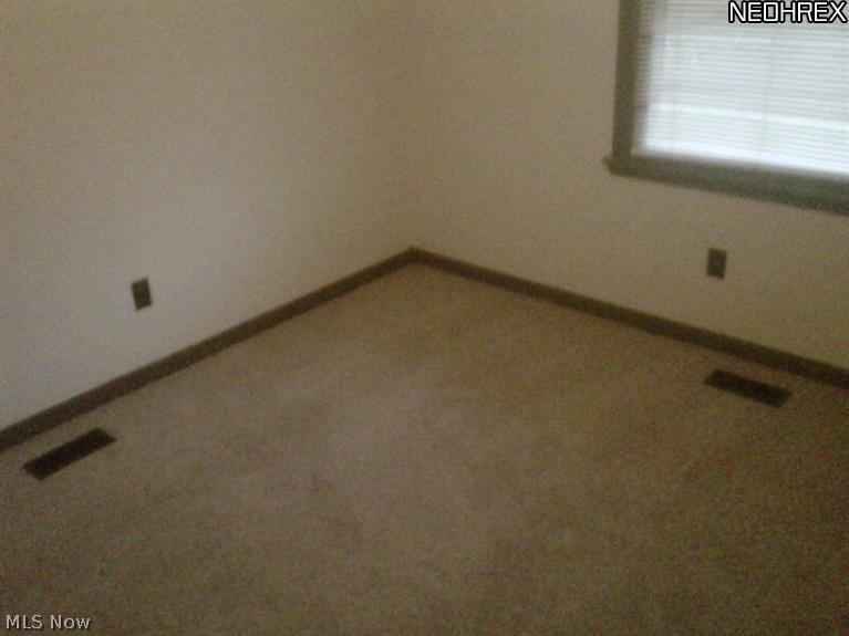 995 Doyle Road Jefferson, OH 44047 - Photo 10 of 13 One of two additional bedrooms in your ranch home.
