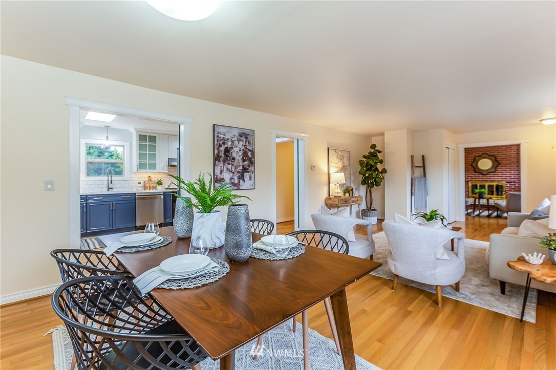 6009 Cady Road Everett, WA 98203 - Photo 16 of 40 a view of a dining room with furniture and wooden floor