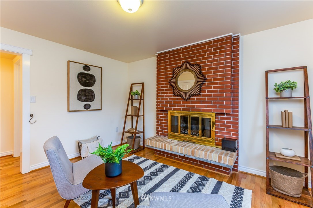 6009 Cady Road Everett, WA 98203 - Photo 17 of 40 a living room with furniture and a fireplace